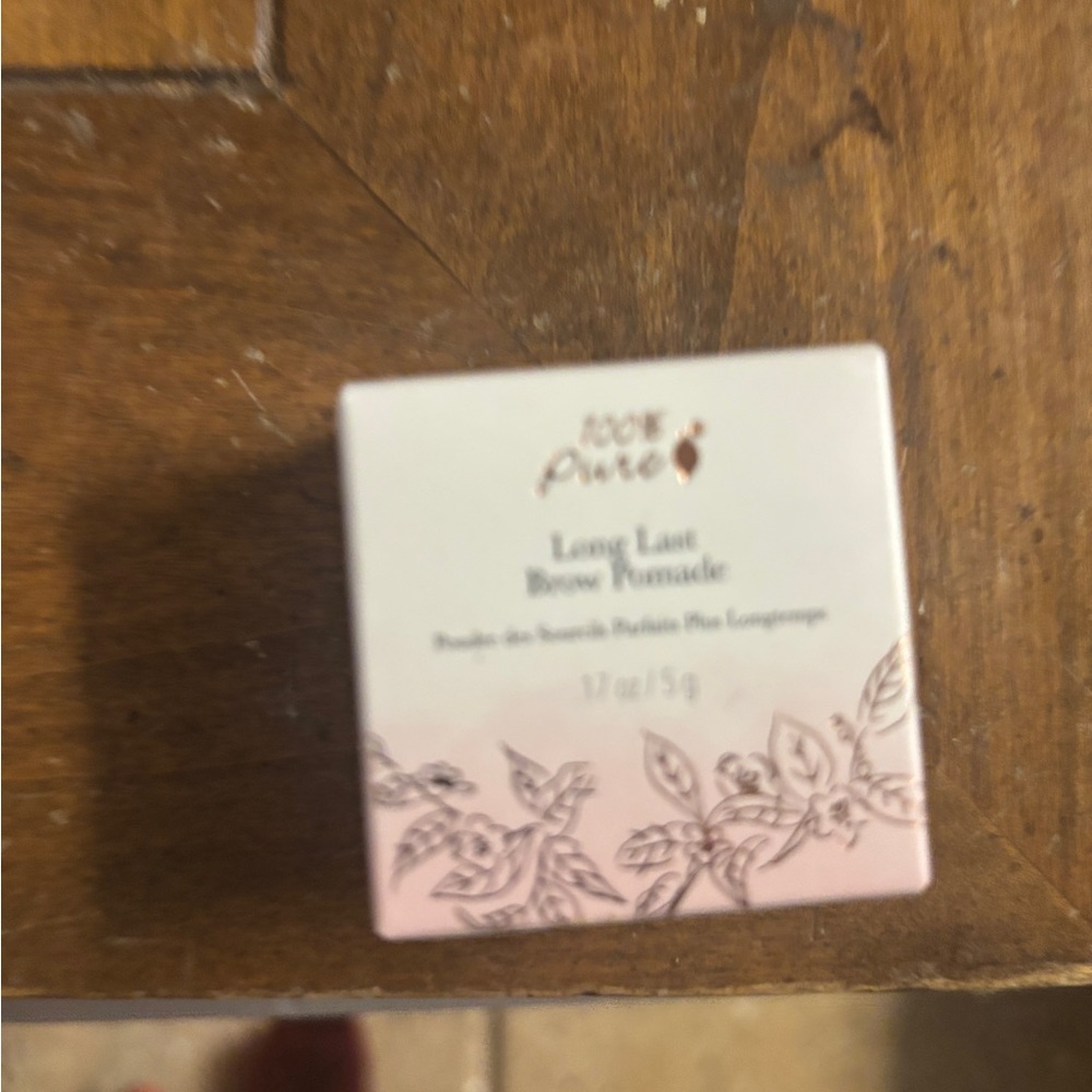 100% Pure Brow Pomade in brown, new sealed container